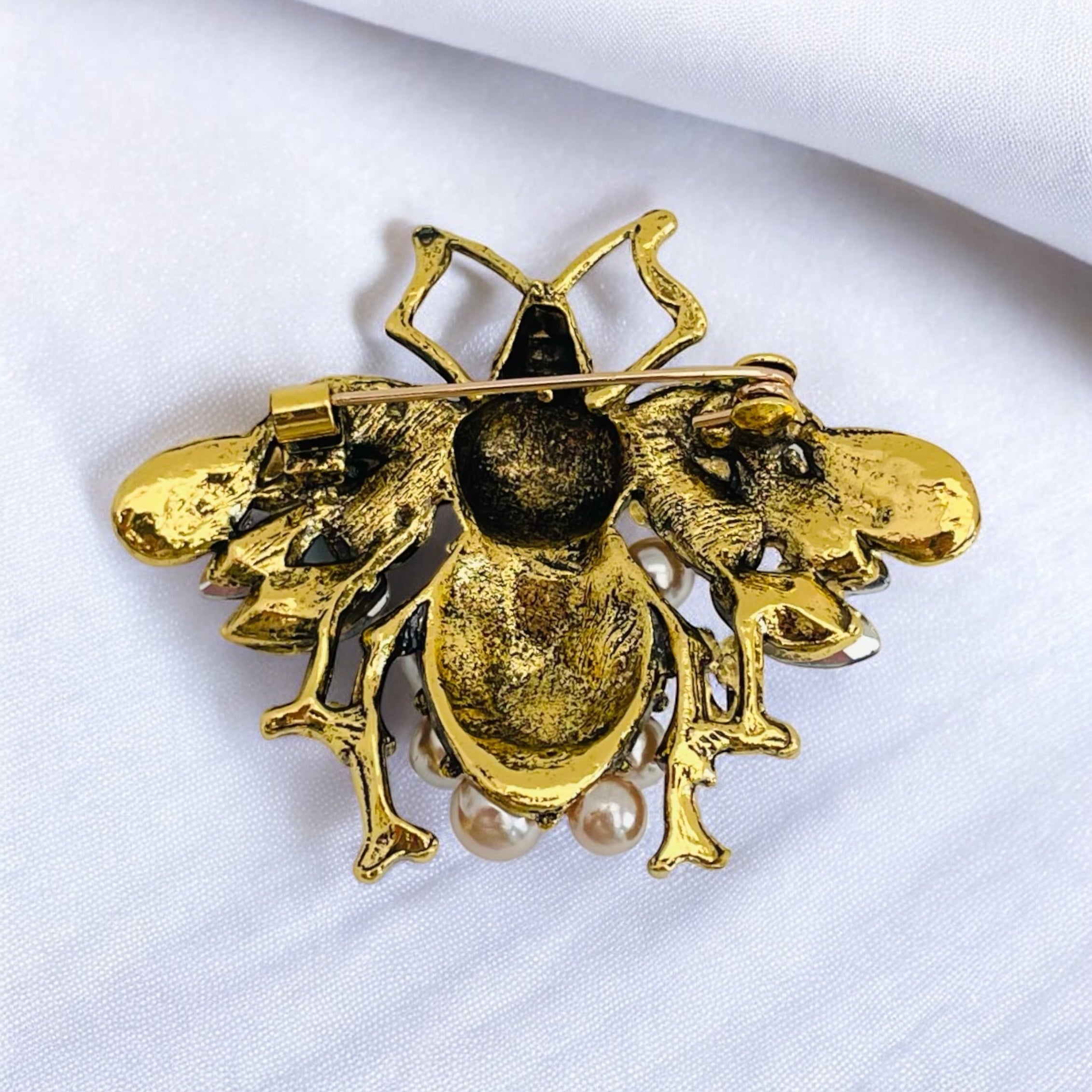 Broche Saya