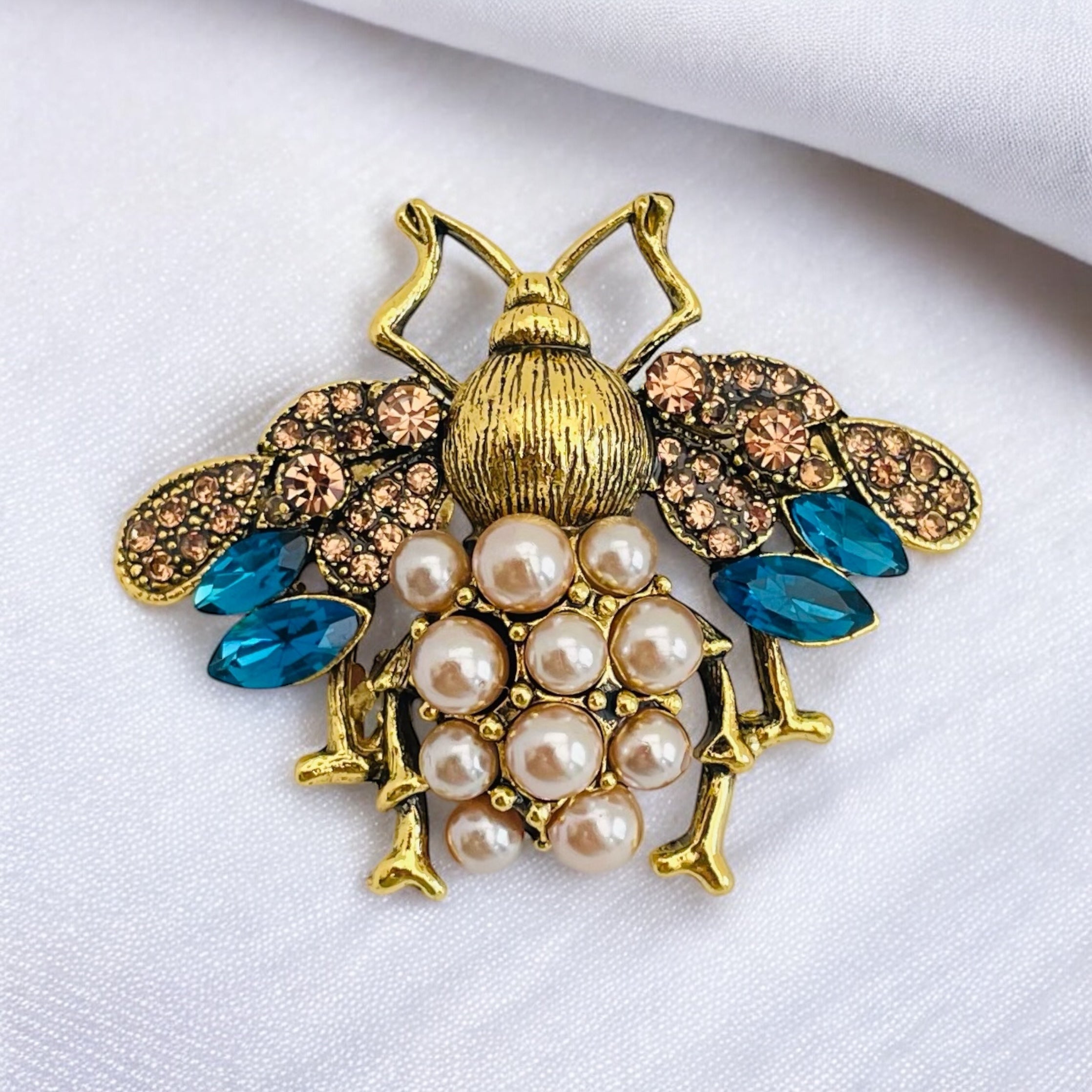 Broche Saya